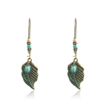 Women's Bohemian Retro Turquoise Hollow Exotic Earrings