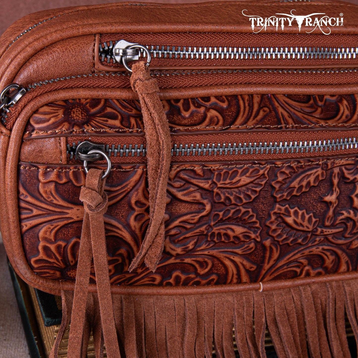 TR165-198  Trinity Ranch Floral Tooled Triple Zippered Pocket Fringe Belt Bag