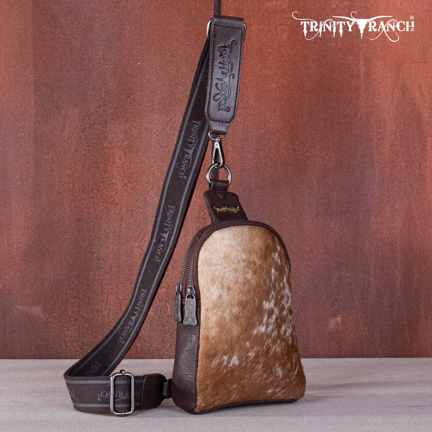 Trinity Ranch Genuine Hair-On Cowhide  Collection Sling Bag