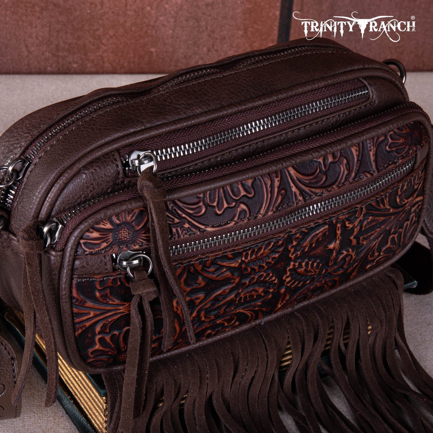 TR165-198  Trinity Ranch Floral Tooled Triple Zippered Pocket Fringe Belt Bag