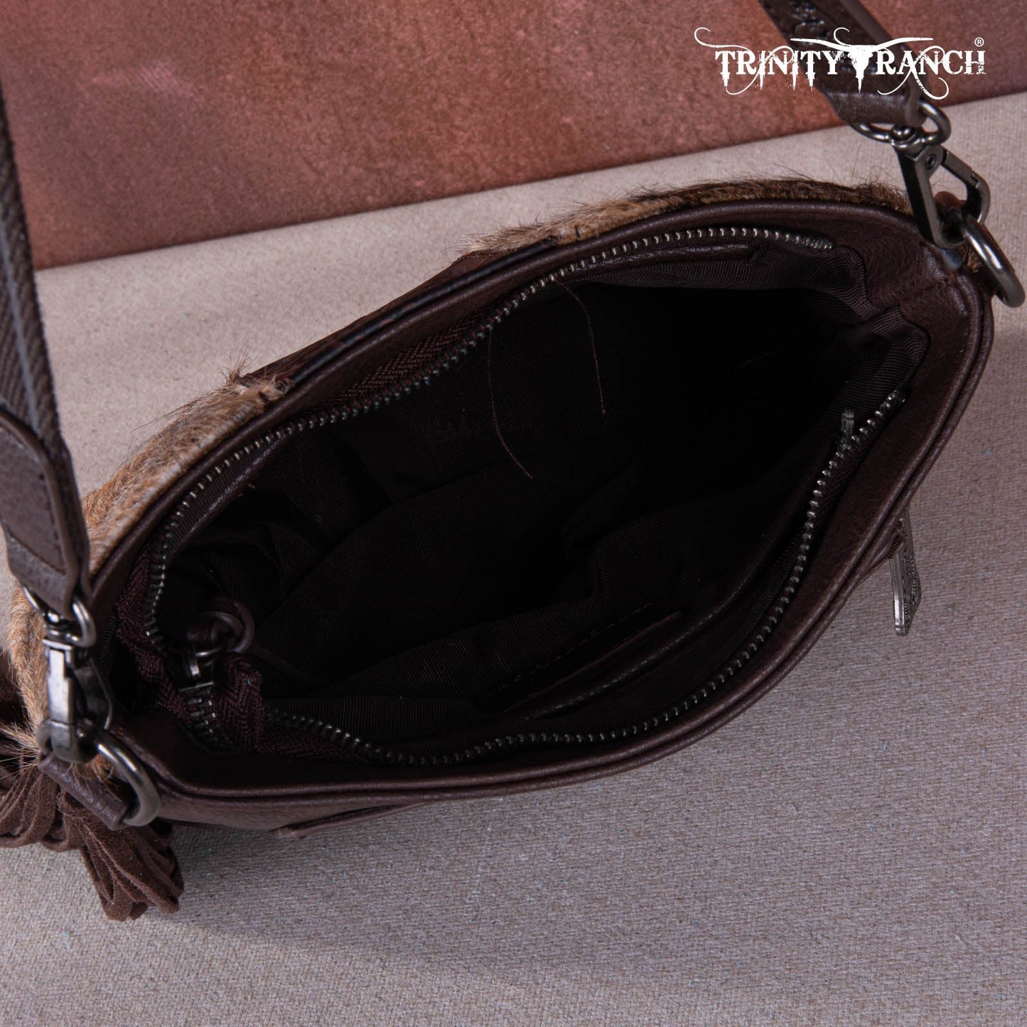 TR159G-9360   Trinity Ranch Hair-On Cowhide/Tooled Fringe Concealed Carry Crossbody Bag