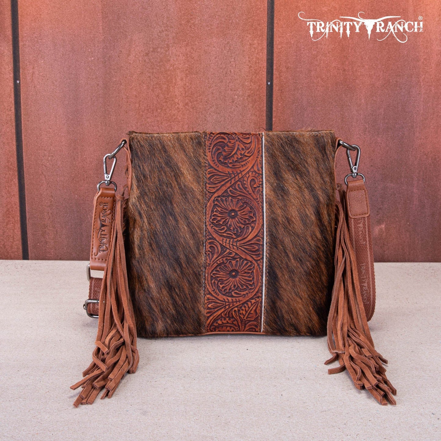 TR159G-9360   Trinity Ranch Hair-On Cowhide/Tooled Fringe Concealed Carry Crossbody Bag