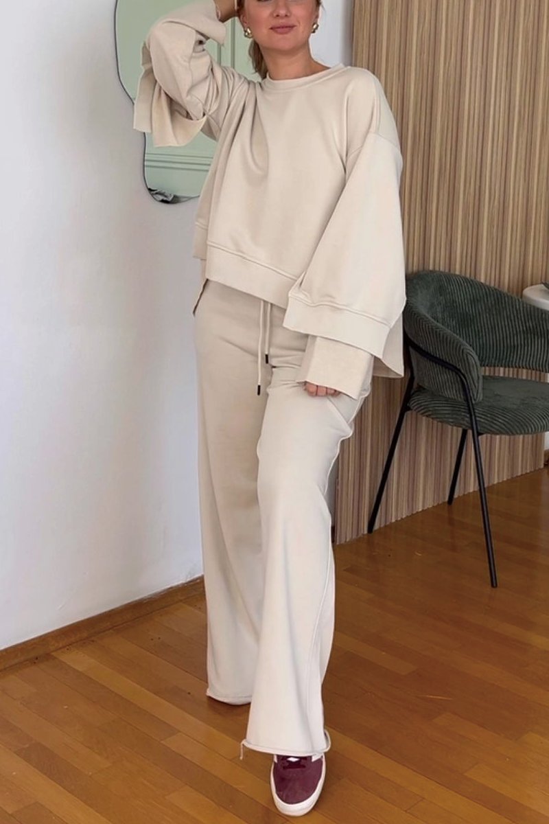 Women's asymmetric cut pullover trousers set